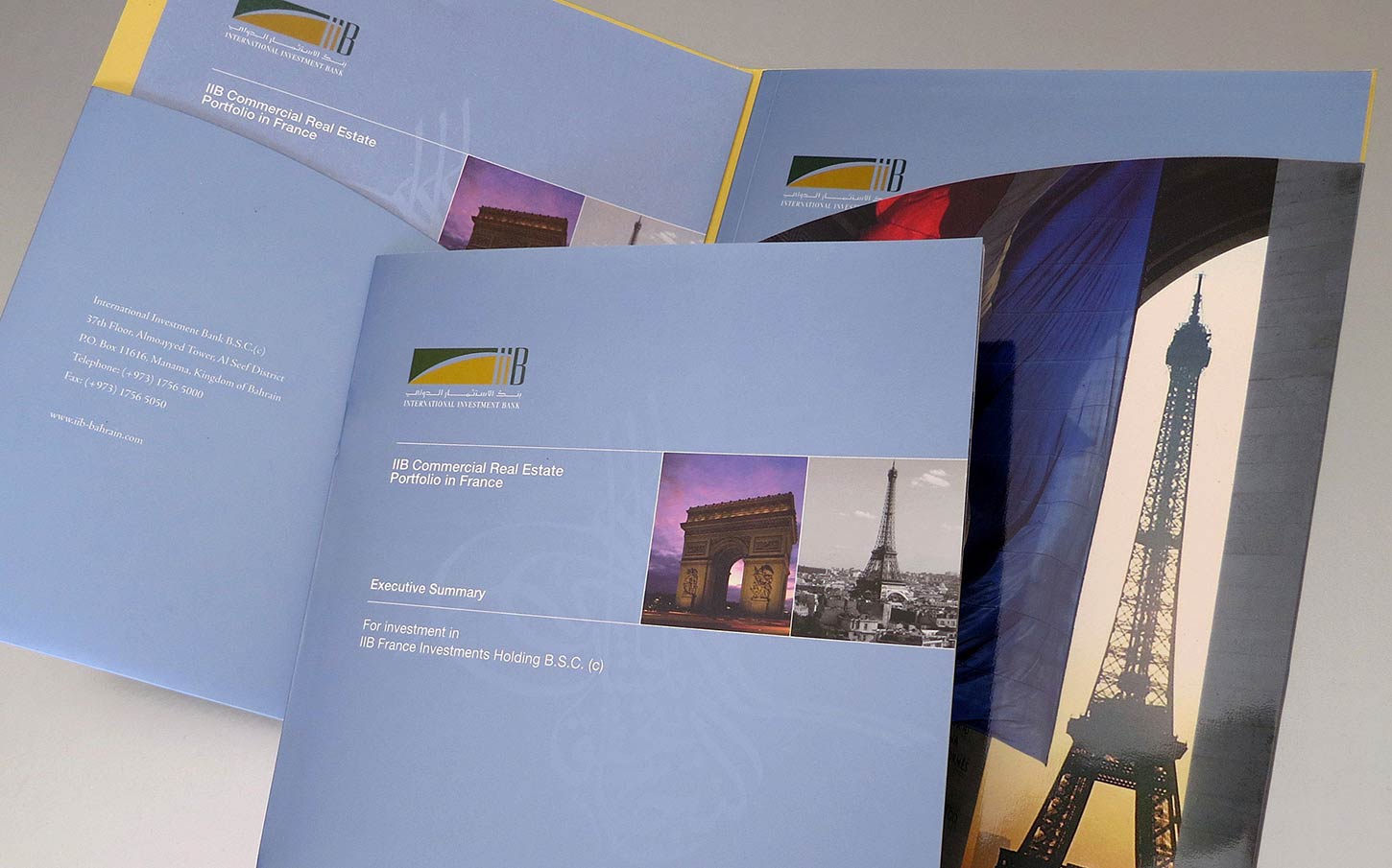 An executive summary document and folder for the "IIB Commercial Real Estate Portfolio in France," featuring the International Investment Bank logo, contact details, and imagery of Parisian landmarks such as the Arc de Triomphe and the Eiffel Tower.