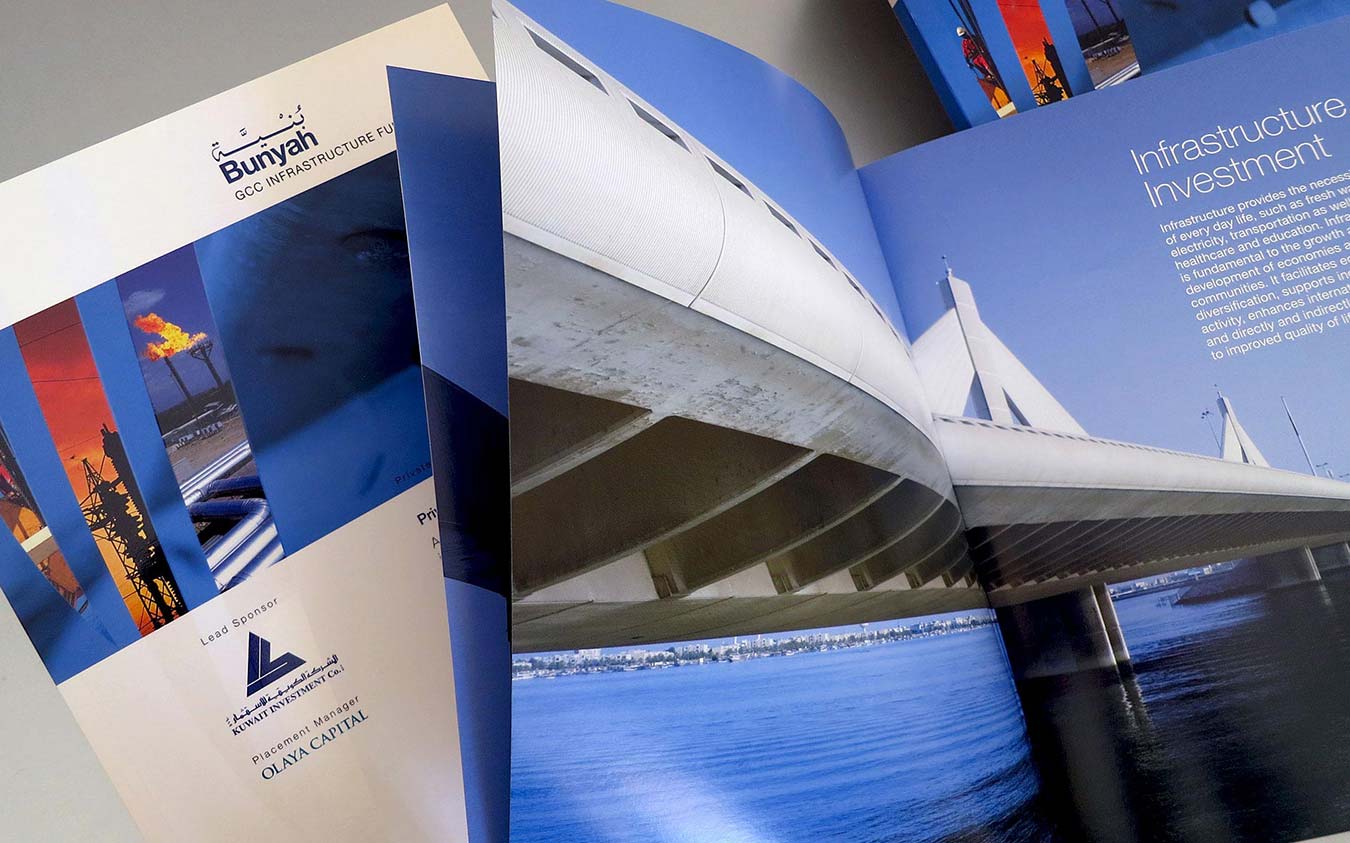an open brochure for the Bunyah GCC Infrastructure Fund, featuring a left page with industrial branding and a right page with a large photograph of a bridge and text about infrastructure investment.