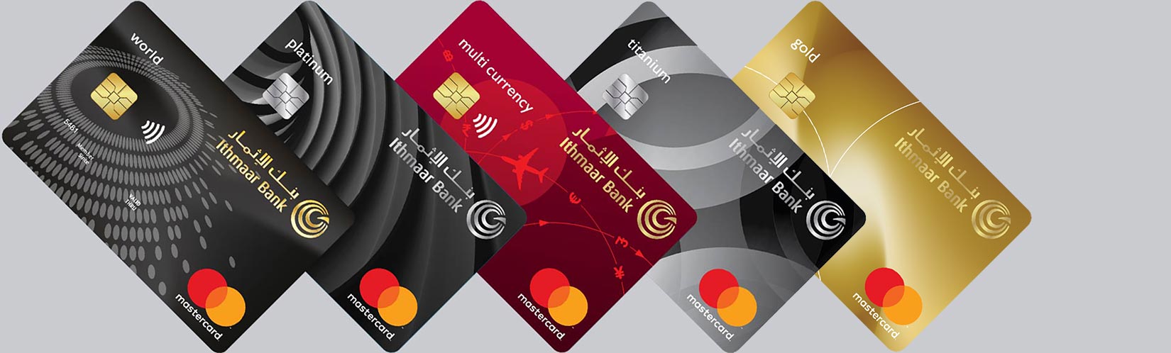 A lineup of five different Ithmaar Bank credit cards arranged in a fan shape against a grey background, featuring the World, Platinum, Multi-Currency, Titanium, and Gold Mastercard options, each displaying the bank's logo.